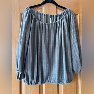 Free People sweater-like blouse. Can be worn off the shoulders or normally